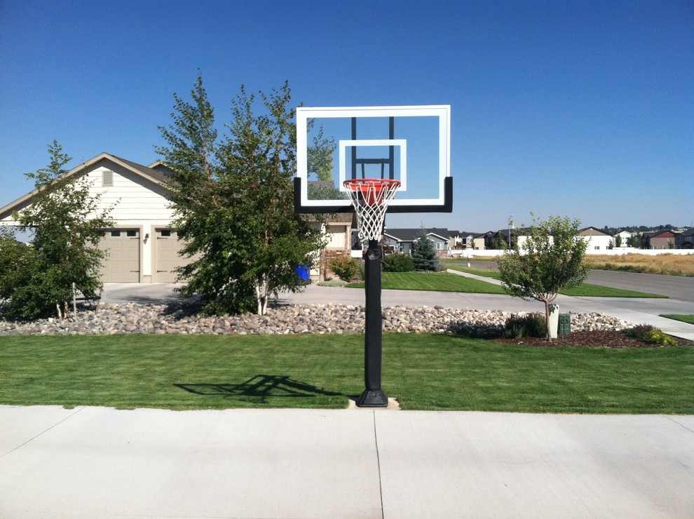 Photo of a large traditional full sun front yard outdoor sport court in Boise.