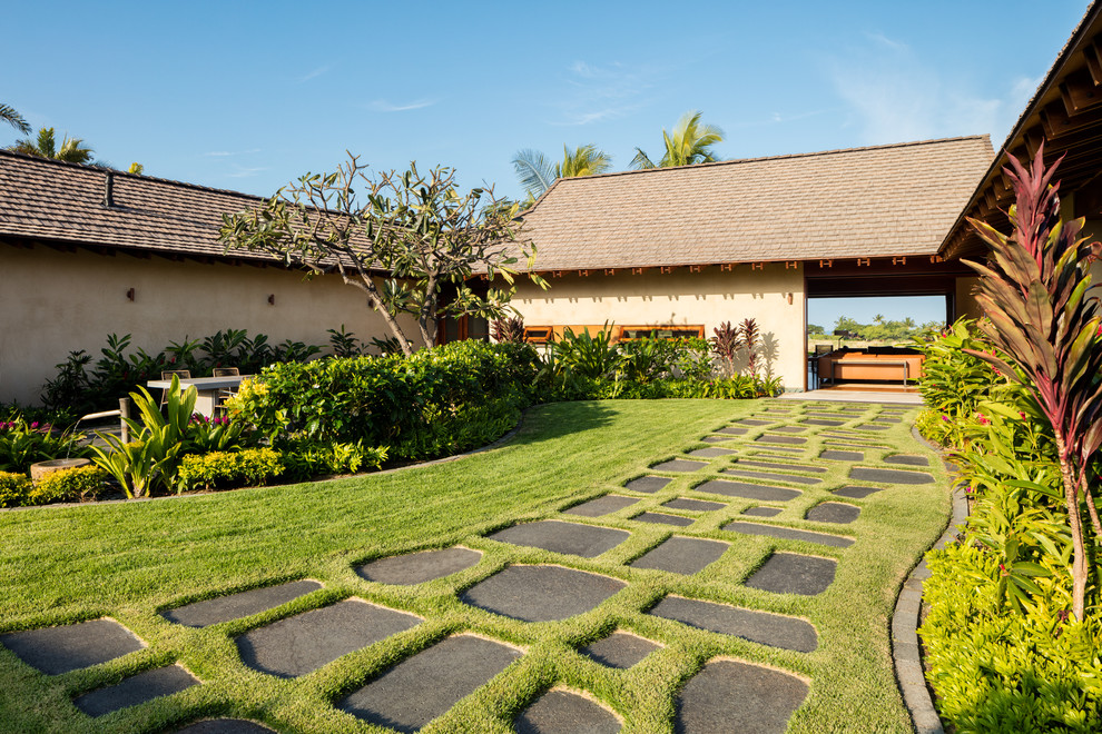 Design ideas for a world-inspired garden in Hawaii with a garden path.