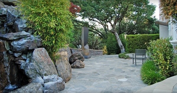 Design ideas for a mid-sized asian partial sun backyard water fountain landscape in San Francisco.