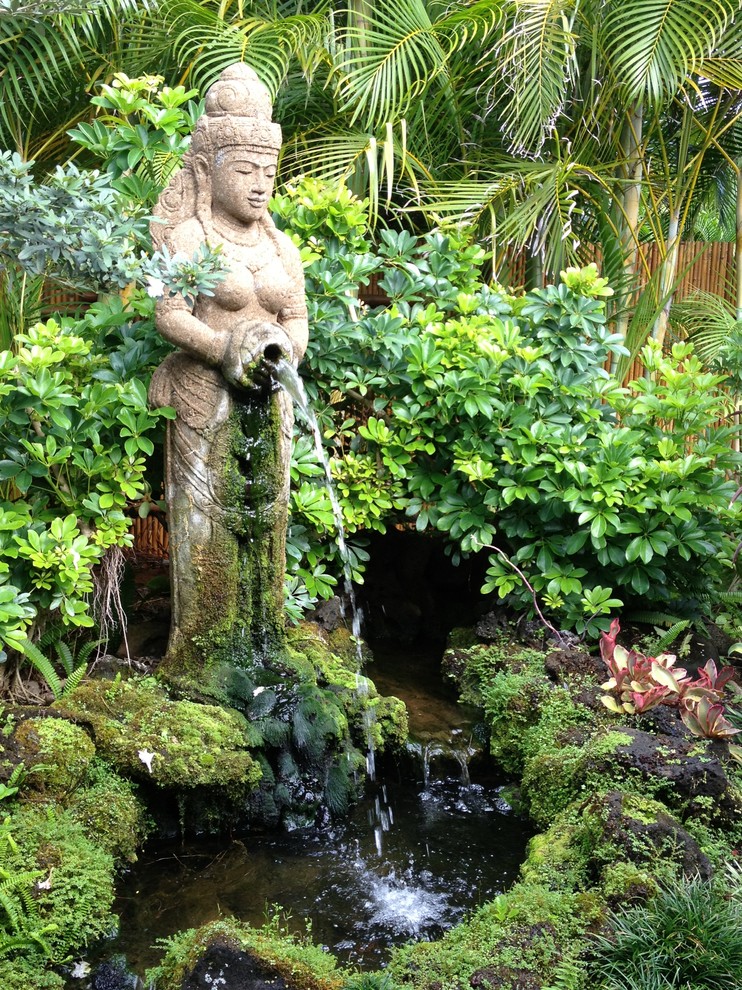 Idéer för att renovera en tropisk trädgård, med en fontän
