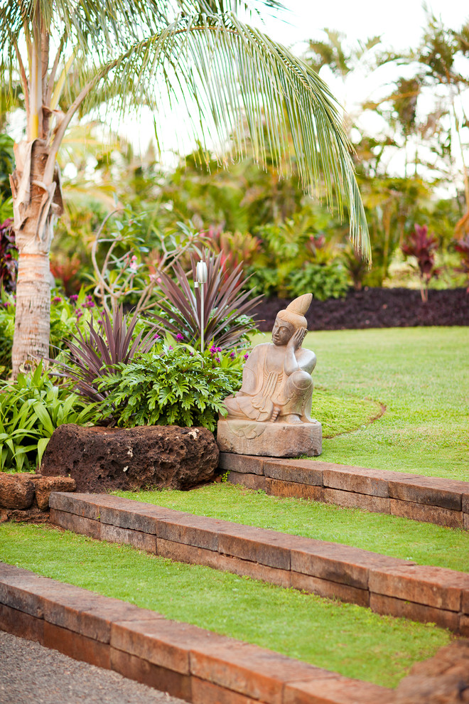 This is an example of a tropical backyard landscaping in Hawaii.
