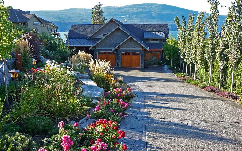 Kelowna Lake House Rustic Landscape Dallas by DDLA Design