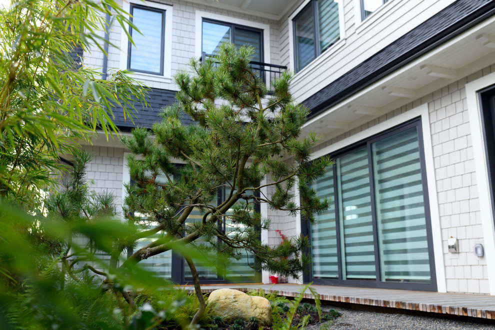 Esempio di un orto rialzato american style in ombra di medie dimensioni e nel cortile laterale in primavera con pedane