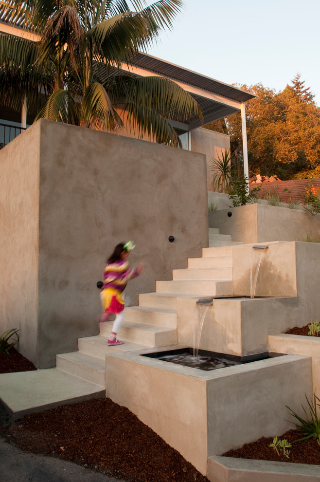 Photo of a contemporary garden in San Francisco with a water feature.