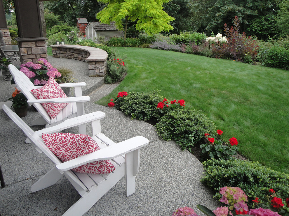 Design ideas for a mid-sized craftsman partial sun backyard decomposed granite garden path in Seattle for spring.