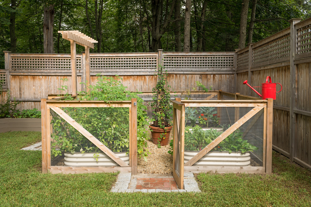 Design ideas for a farmhouse backyard landscaping in Boston.
