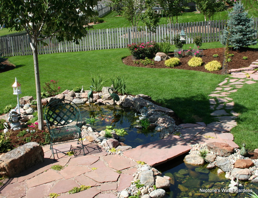 Photo of a large rustic water fountain landscape in Omaha.
