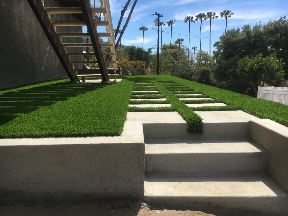Design ideas for a medium sized modern side xeriscape full sun garden in Orange County with concrete paving.