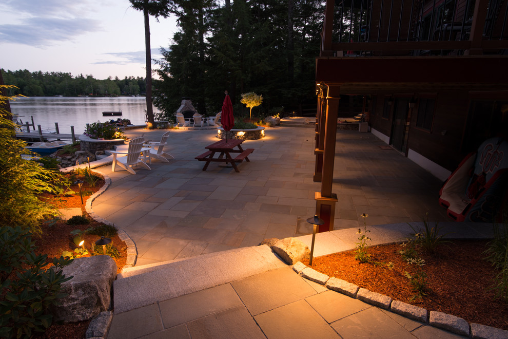 Inspiration for an expansive rustic back full sun garden for summer in Manchester with natural stone paving.