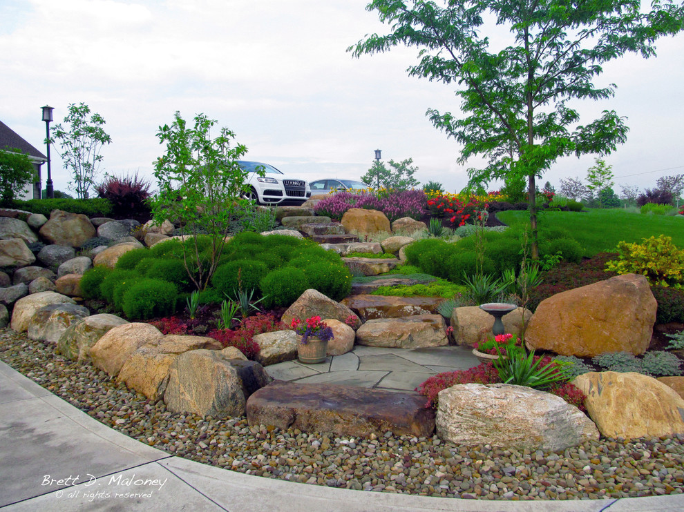 Inspiration for a large coastal drought-tolerant and full sun hillside stone garden path in Other for summer.