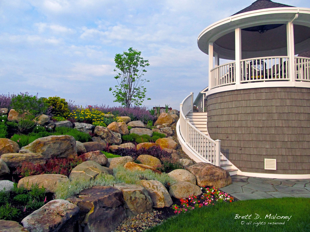 Photo of a large coastal full sun and drought-tolerant hillside stone garden path in Other for summer.