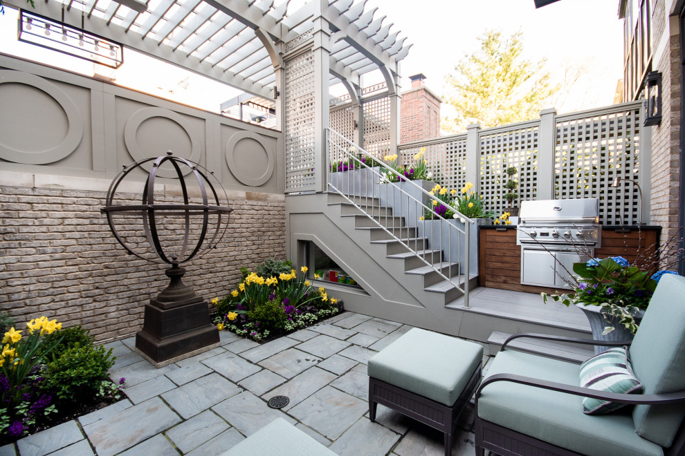 Inspiration for a small french country partial sun rooftop formal garden in Chicago for spring.