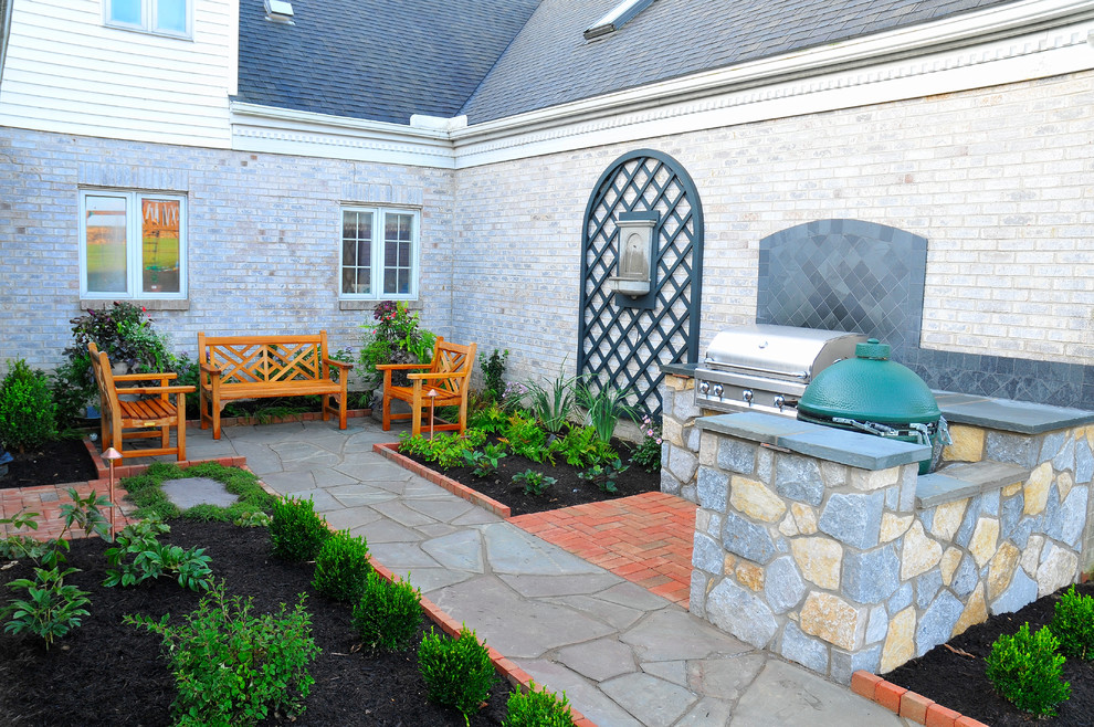 Design ideas for a small traditional partial sun courtyard stone garden path in Philadelphia.