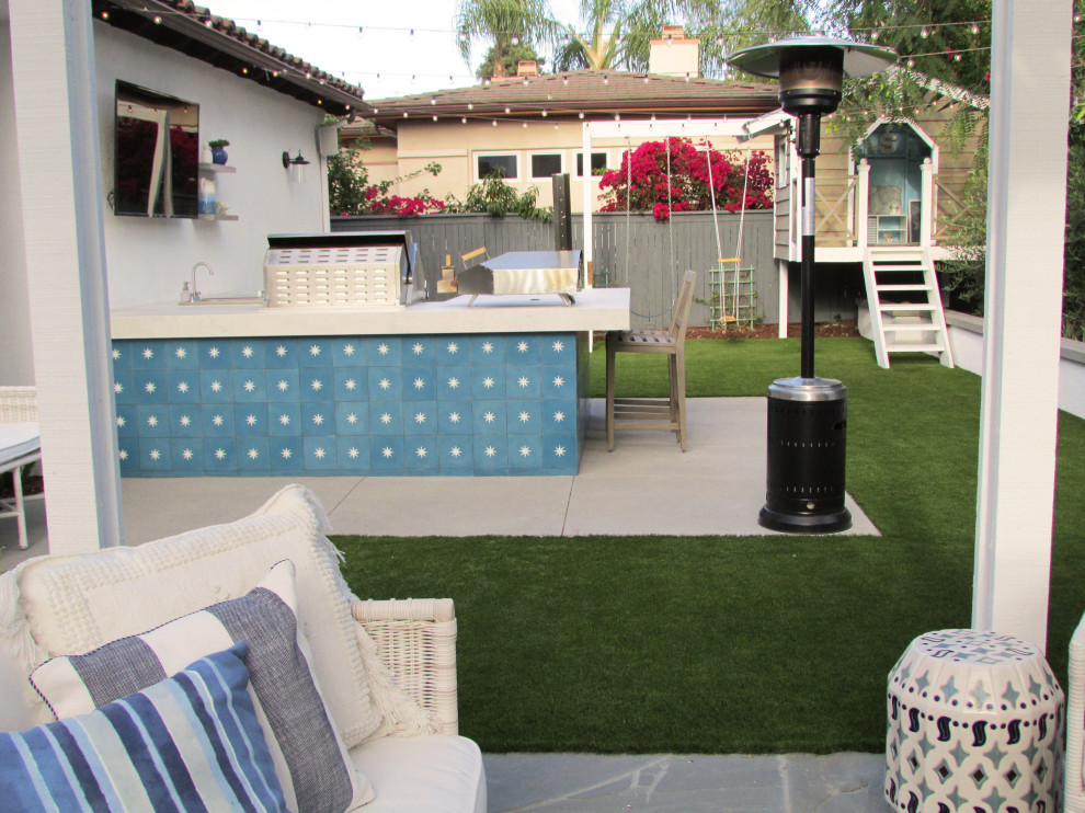 Design ideas for a medium sized modern back garden in San Diego with a climbing frame.