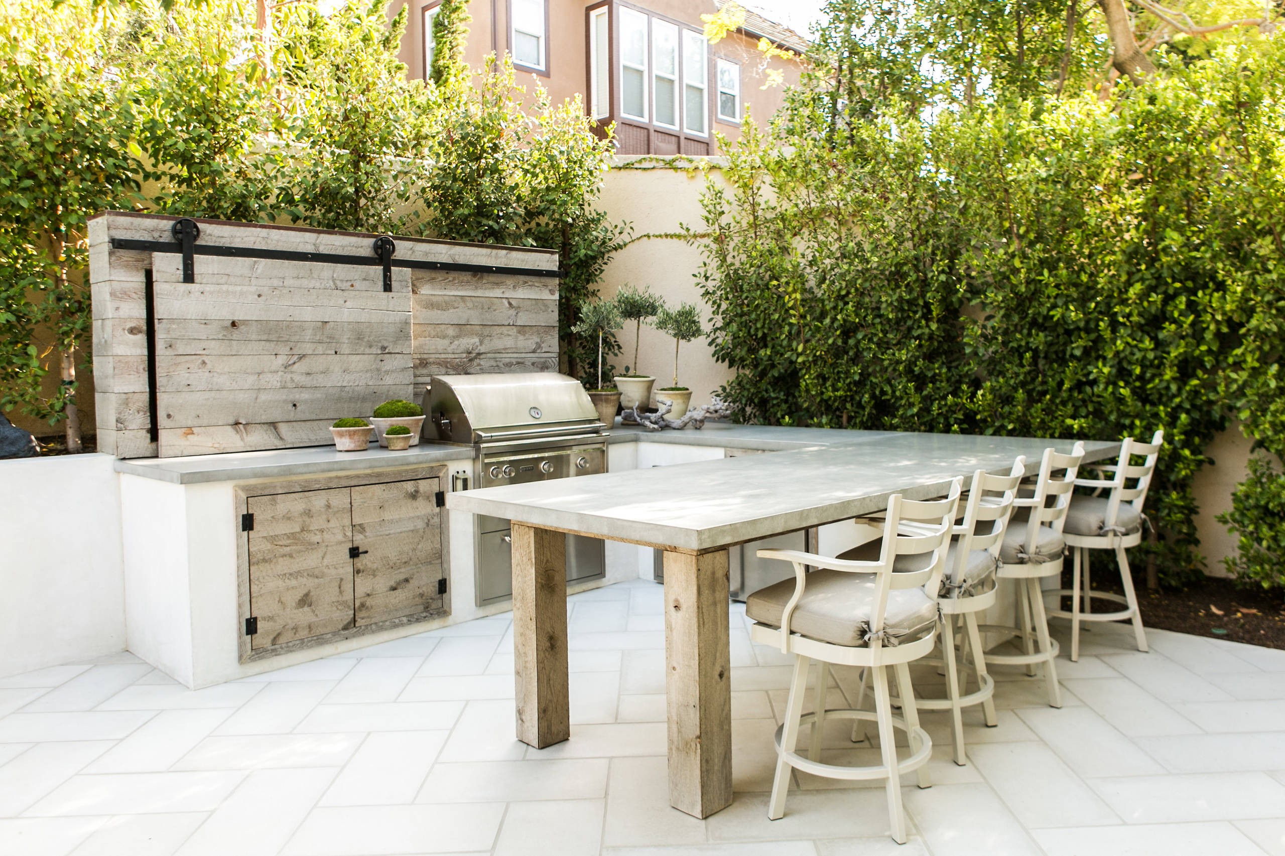 Outdoor kitchen with bar seating hotsell