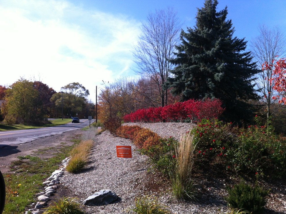 Landscape Berm in Brighton Michigan - Traditional - Landscape - Detroit