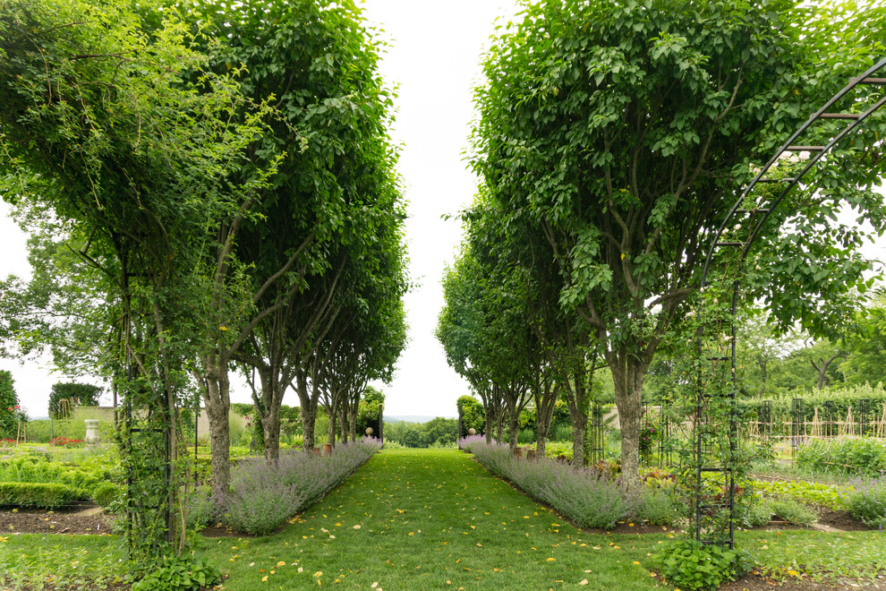 Photo of an expansive mediterranean formal garden in New York with a vegetable patch.