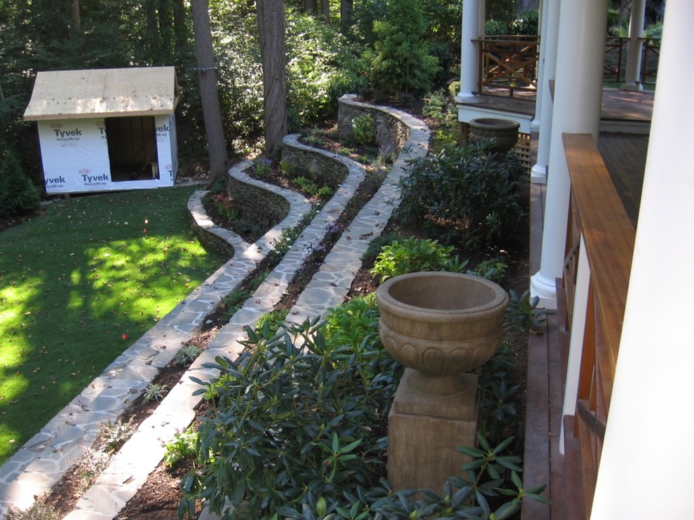 Design ideas for a classic garden in New York with a garden path and natural stone paving.