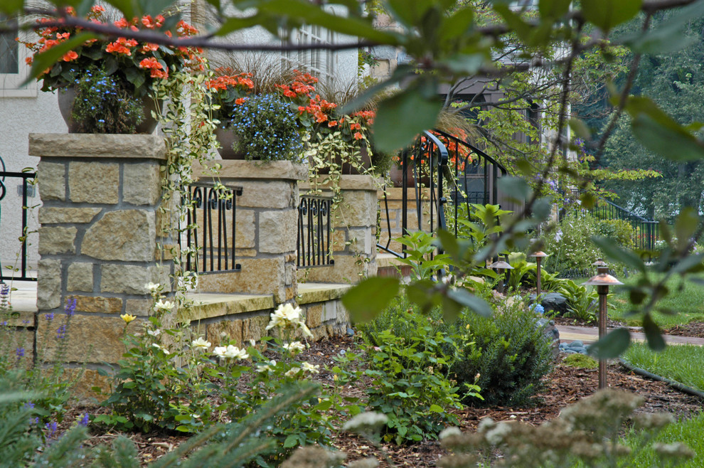 This is an example of a large traditional landscaping in Minneapolis.