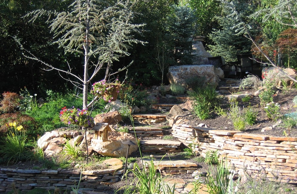 Design ideas for a large rustic hillside stone garden path in Salt Lake City.