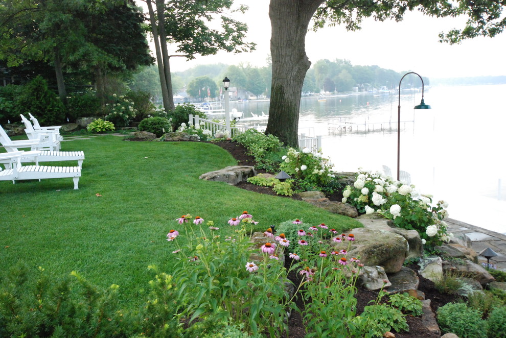 Photo of a traditional retaining wall landscape in Other.