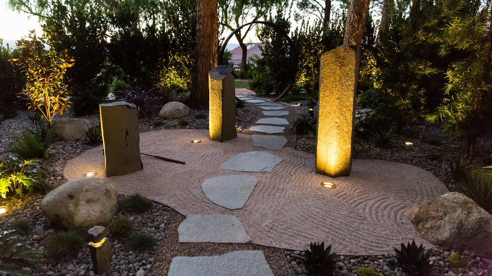 Inspiration for a small asian drought-tolerant and shade side yard gravel garden path in Las Vegas.