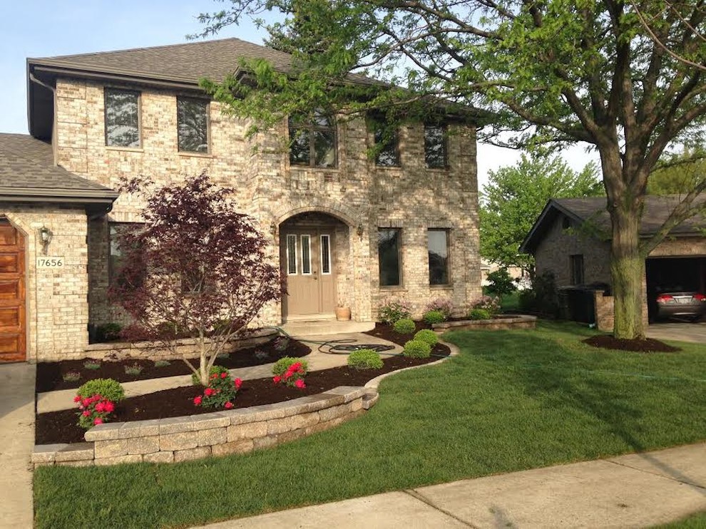 This is an example of a front yard retaining wall landscape in Chicago.