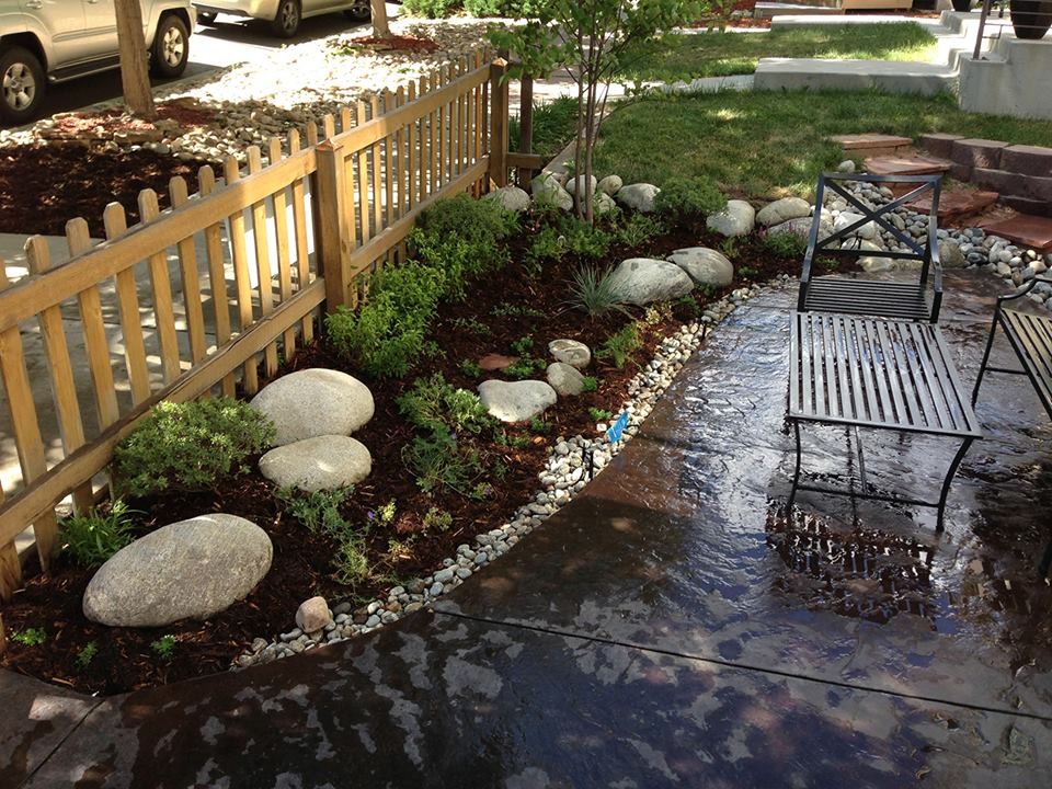 Inspiration for a mid-sized traditional full sun front yard concrete paver landscaping in Denver for spring.