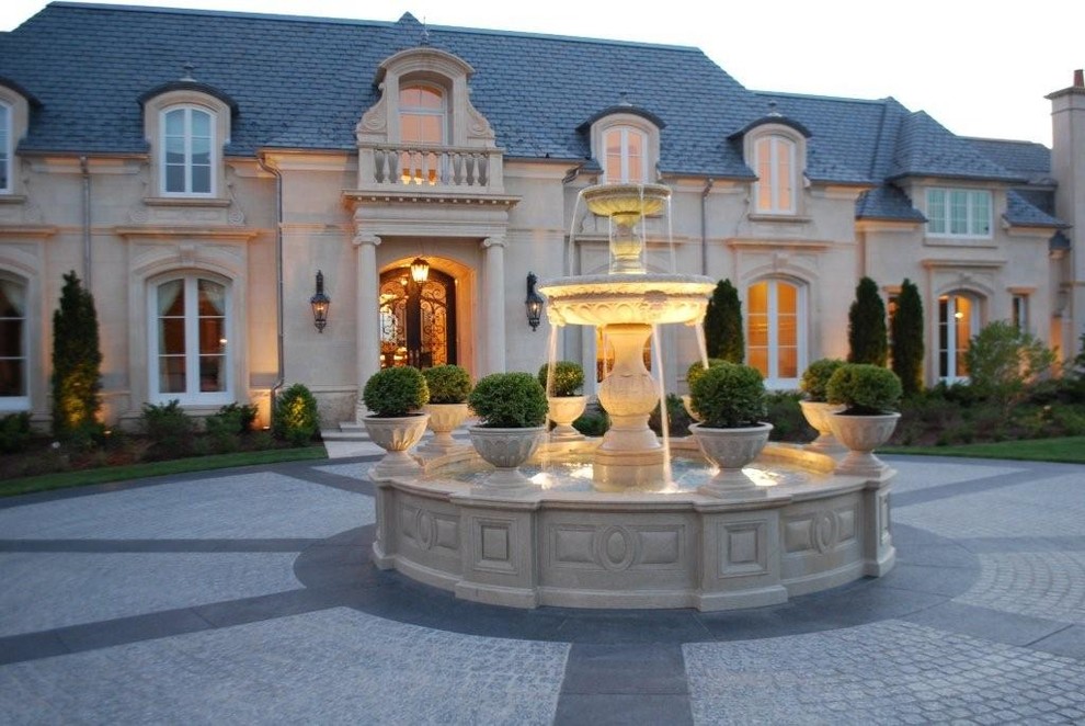 Design ideas for a huge mediterranean full sun front yard stone landscaping in Denver for spring.