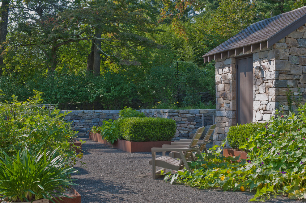 Design ideas for a mid-sized contemporary partial sun backyard gravel formal garden in New York.