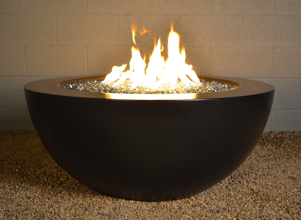 Inspiration for a small contemporary partial sun backyard gravel landscaping in Los Angeles with a fire pit for spring.