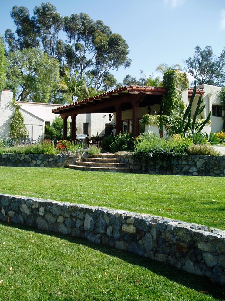 Design ideas for a mediterranean backyard landscaping in San Diego.