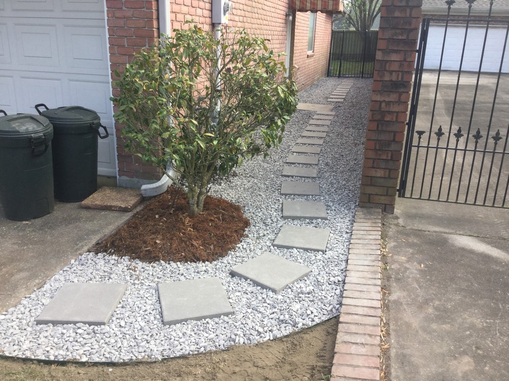 Limestone walkways with stepping stones Landscape New Orleans by