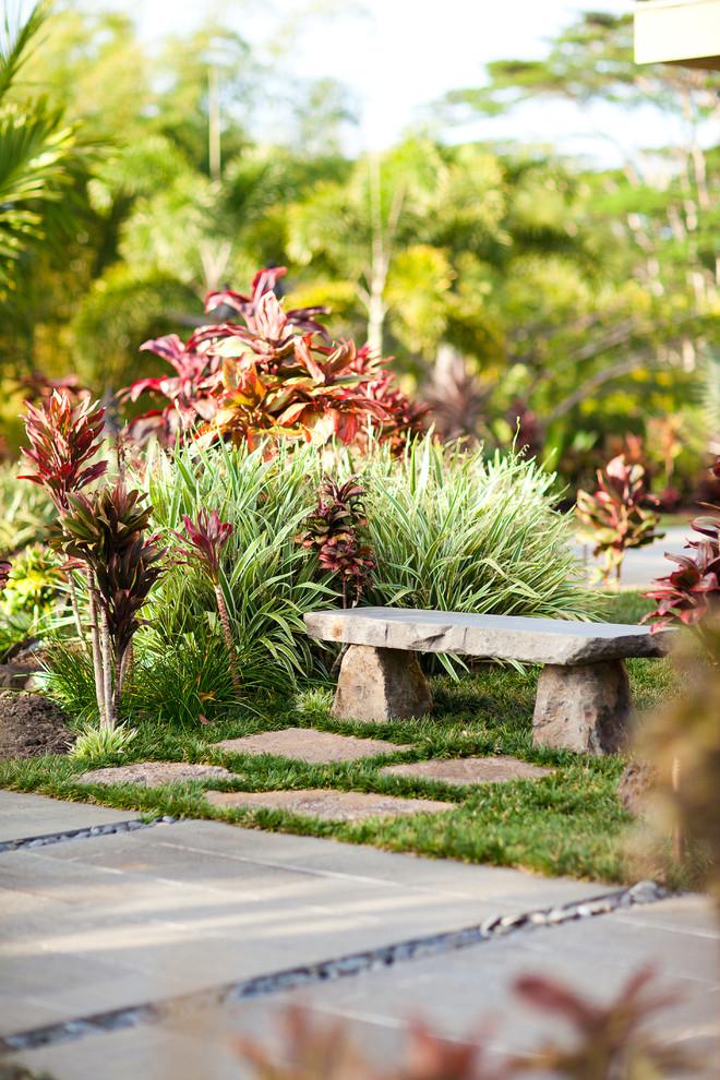 This is an example of a tropical backyard landscaping in Hawaii.