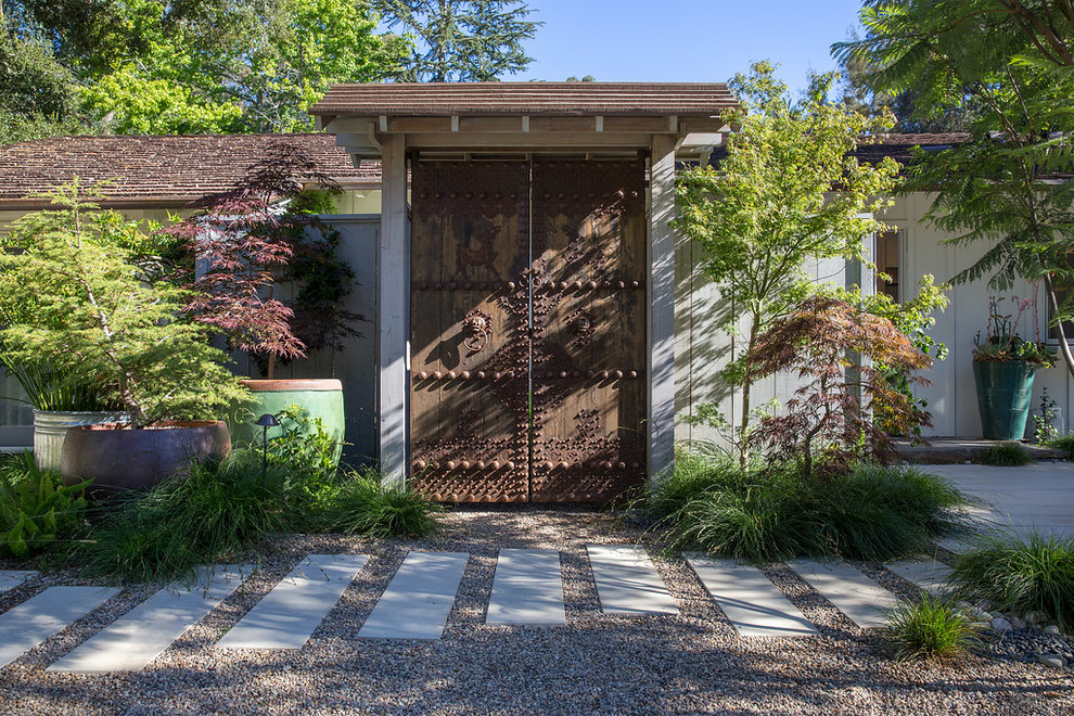 Design ideas for a huge farmhouse partial sun backyard gravel landscaping in Santa Barbara.