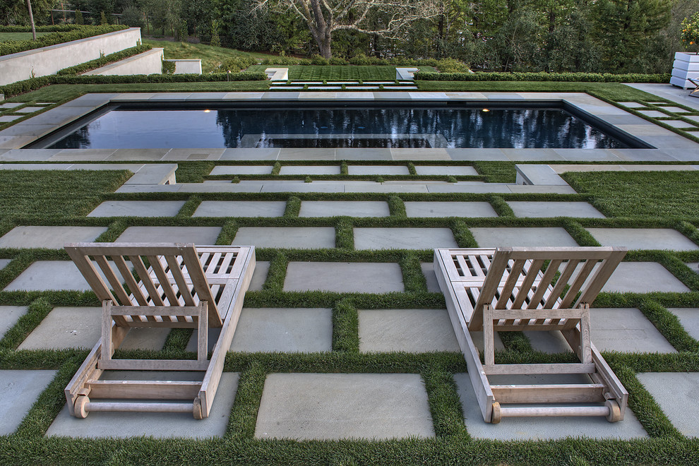 Photo of a huge contemporary full sun backyard stone formal garden in San Francisco.