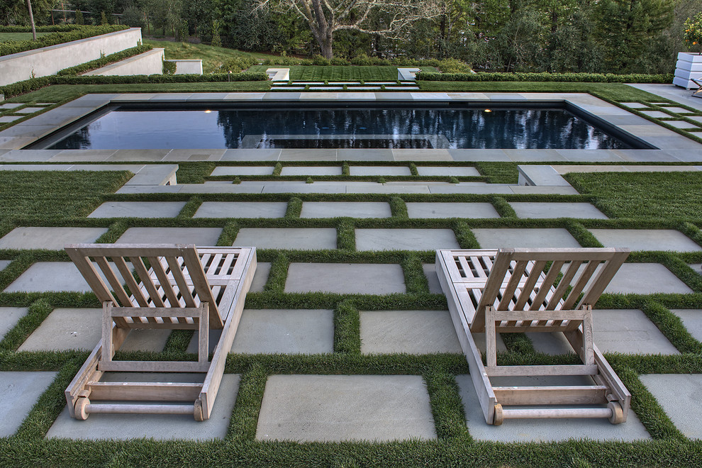 Photo of a huge contemporary full sun backyard stone formal garden in San Francisco.