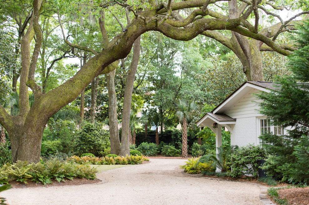 Inspiration for a huge rustic partial sun front yard landscaping in Charleston.