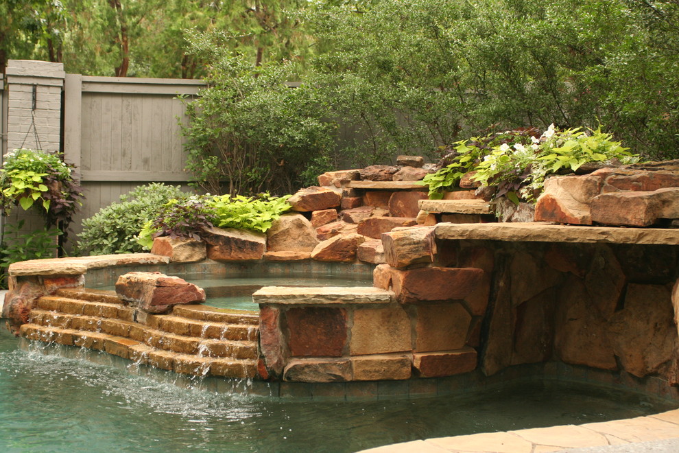 Inspiration for a mid-sized transitional partial sun backyard stone garden path in Dallas for summer.