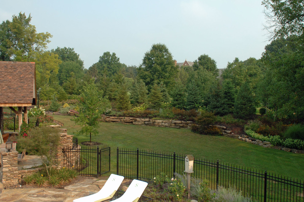 Photo of a large traditional full sun backyard stone garden path in St Louis for spring.