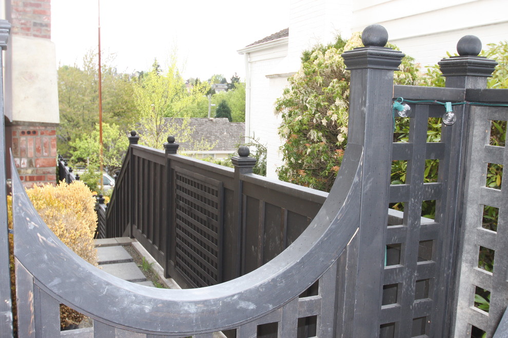 Foto de jardín tradicional grande en patio delantero con exposición total al sol, adoquines de piedra natural, jardín francés y camino de entrada
