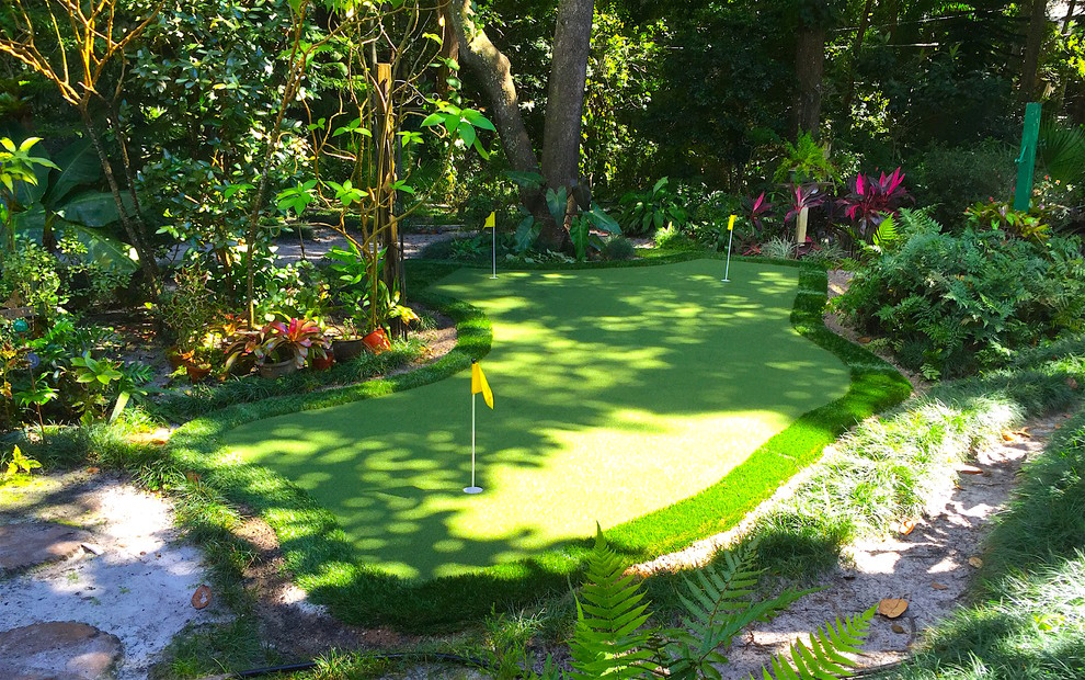 Inspiration for a medium sized world-inspired back garden in Orlando with an outdoor sport court.