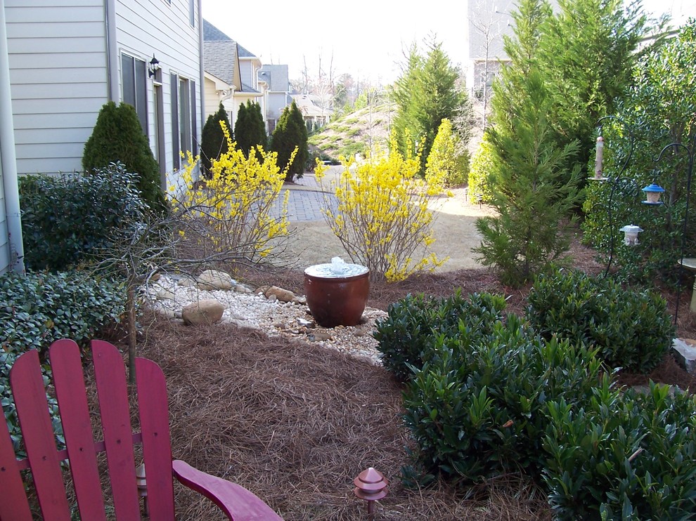 Photo of a small craftsman backyard landscaping in Atlanta.