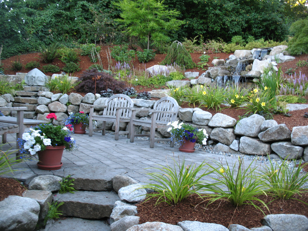 Design ideas for a rustic garden for summer in Seattle with concrete paving.