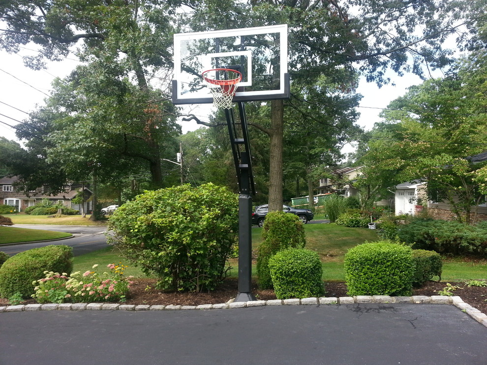 Inspiration for a large traditional front yard outdoor sport court in New York.