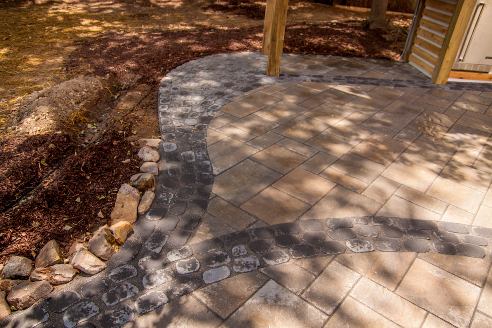 Medium sized traditional back partial sun garden for summer in Raleigh with a fire feature and concrete paving.