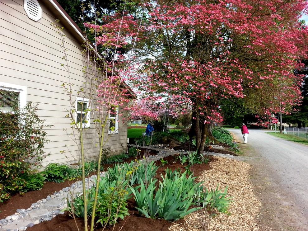 This is an example of a farmhouse landscaping in Portland.