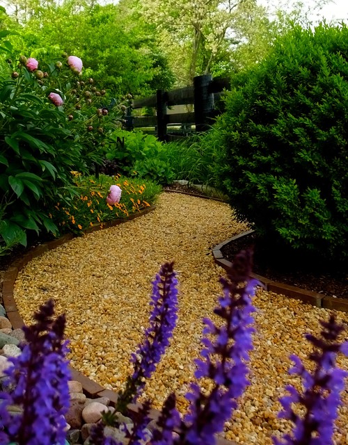 meandering pea gravel path with brick border Traditional Garden