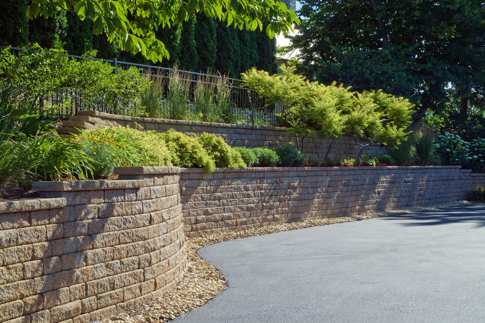 Inspiration for a mediterranean retaining wall landscape in Chicago.