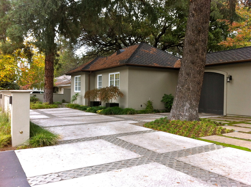 Inspiration for a large classic courtyard driveway partial sun garden for spring in San Francisco with concrete paving and a garden path.